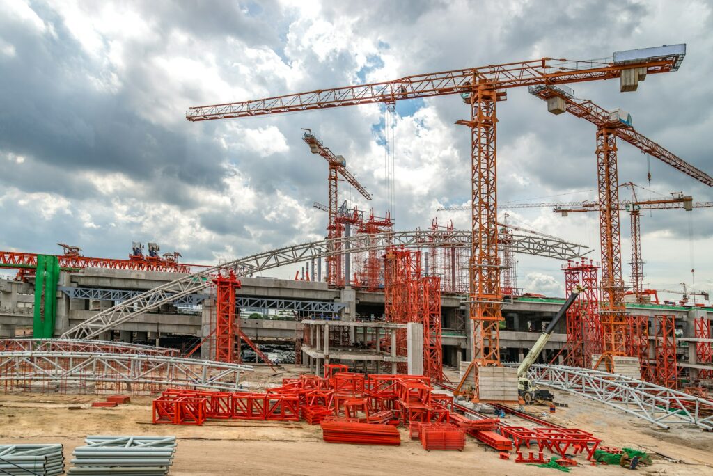 Construction Cranes on Site, Skytrain in Asia